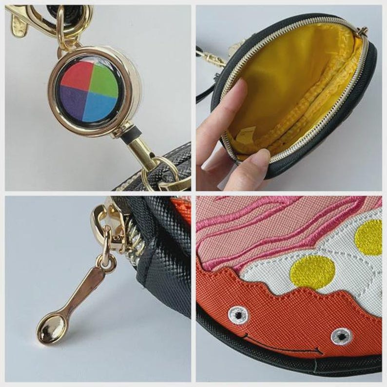 May include: A black coin purse with a gold zip and a spoon-shaped charm. The purse has a colourful design on the front and a yellow interior. It includes a retractable badge reel with a colourful design.