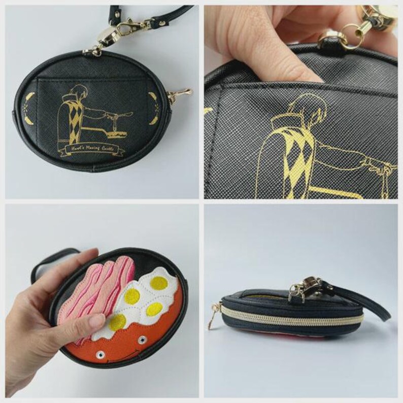 May include: Black oval coin purse with a gold zip and strap. The front features a gold illustration of a character from Howl's Moving Castle. The purse has a small front pocket. Another purse shows a colourful design of a meal.