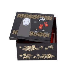 May include: Black two-tiered box with a hinged lid, featuring illustrations from a Japanese animated film. The lid displays a gray figure with a white mask, red accents, and gold wave patterns. The box is open, revealing a red interior.