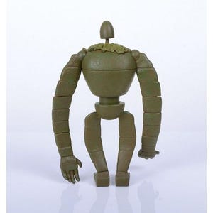 Peut inclure: Une figurine de robot vert avec des membres segment&eacute;s et un corps arrondi. La figurine a une petite t&ecirc;te et un morceau de mati&egrave;re verte sur les &eacute;paules. Les bras du robot sont tendus et ses mains sont l&eacute;g&egrave;rement courb&eacute;es.
