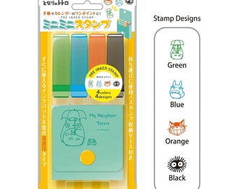 May include: A pre-inked stamp set featuring characters from "My Neighbor Totoro." The set includes four stamp designs in green, blue, orange, and black, with a matching ink pad. The packaging includes Japanese text and a storage case.