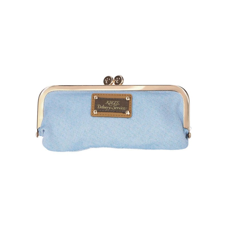 May include: A light blue denim clutch purse with a gold metal frame and a brown leather patch that reads "JIKIS Delivery Service".