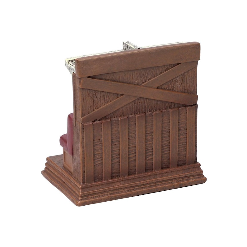 May include: A miniature wooden church model with a brown exterior, featuring a red seat inside. The back of the church has a cross-shaped design. The base is a darker shade of brown.