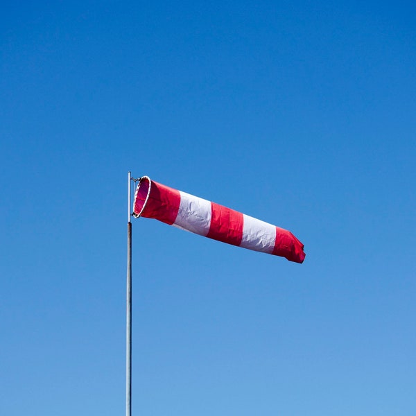 Windsock Against Blue Sky: Nautical Decor, Aviation Photography, Weather Vane Image, Sailing Artwork, Wind Direction Indicator