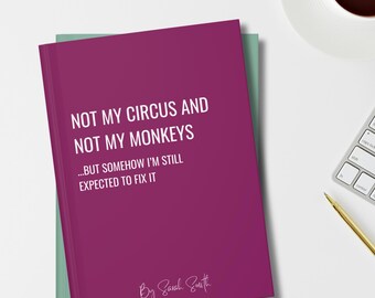 May include: A dark magenta book with white text that reads: NOT MY CIRCUS AND NOT MY MONKEYS ...BUT SOMEHOW I'M STILL EXPECTED TO FIX IT. The author name By Sarah Smith is printed in white script at the bottom of the cover, which rests on a green book.