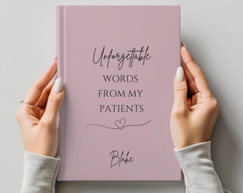 May include: A hardcover journal with a dusty rose cover. The cover features the words "Unforgettable Words From My Patients" in elegant script, along with a heart symbol and the name "Blake" below. The journal is held by two hands.
