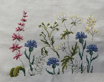 completed cross stitch of wild flowers