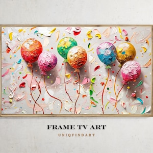 Op de afbeelding: Een ingelijst canvas kunstwerk met een geschilderde textuur van kleurrijke ballonnen. De ballonnen zijn in tinten rood, oranje, groen, blauw, geel en roze, met een impasto-stijl. De achtergrond is lichtgrijs met kleurrijke penseelstreken.