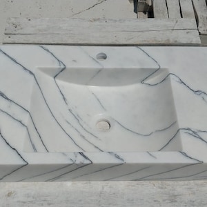 wall-mounted lilac marble rectangular bathroom sink