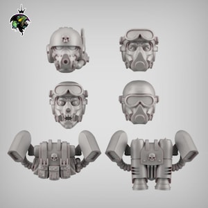 May include: Six 3D printed miniature heads and two 3D printed miniature jetpacks for a sci-fi action figure. The heads are all wearing helmets and gas masks. The jetpacks have a skull design on the front.
