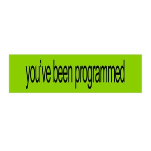 May include: A rectangular sticker with a bright green background and the phrase "you've been programmed" in black text. The sticker is set against a plain white background.