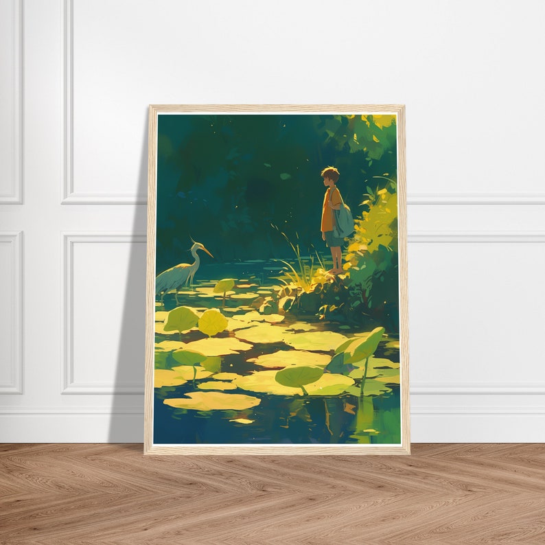 May include: A framed art print depicting a serene pond scene. A person stands on the edge of the water, observing a heron and lily pads. The artwork features a warm color palette with greens, yellows, and blues, creating a peaceful atmosphere.