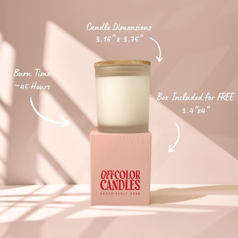 May include: A candle in a frosted glass jar with a wooden lid, sitting on a pink box. The candle dimensions are 3.15" x 3.75". The box is 3.4" x 4". The text on the box reads "OFFCOLOR CANDLES". The burn time is approximately 45 hours.