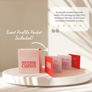 May include: A pink Offcolor Candles box with red text and a scent profile packet. The packet includes cards with scent descriptions. The packaging is on a white pedestal with a customer review.