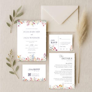 May include: Wedding invitation suite featuring floral accents. The set includes an invitation, RSVP card, details card, and envelope. The invitation displays the names Julia Harvard and Jack Windsor, with the date December 22.