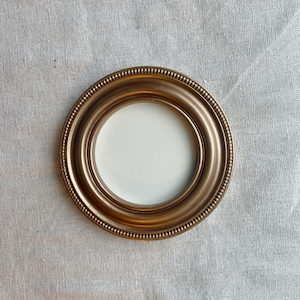 May include: A set of three ceramic nesting bowls in shades of blue, green, and white. The bowls feature a speckled glaze and a simple, modern design. The largest bowl measures approximately 6 inches in diameter.