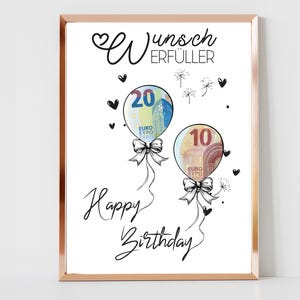 Może przedstawiać: Biała kartka z złotą ramką, na której widnieje życzenie urodzinowe z tekstem "Happy Birthday" i dwa balony z banknotami euro w środku. Na górze kartki widnieje tekst "Wunsch Erfüller".