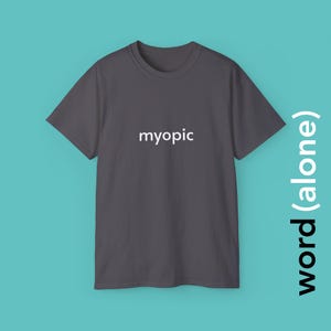 May include: A dark grey t-shirt with the word "myopic" printed in white on the front.