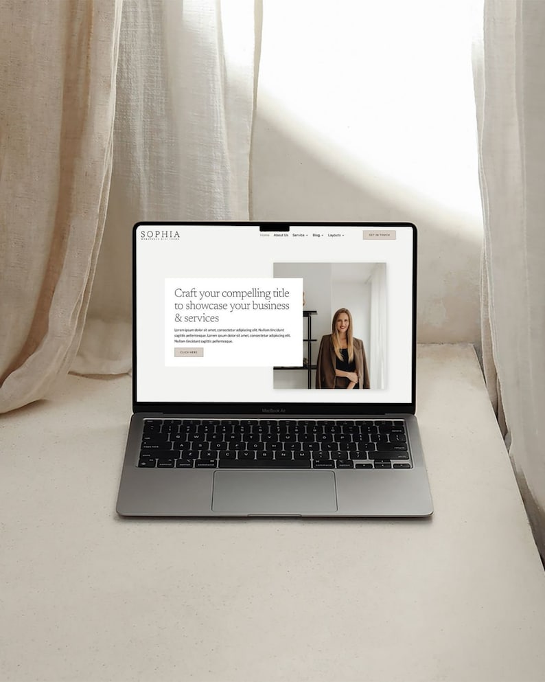 May include: A laptop computer with a website open on the screen. The website has a white background with black text. The text on the website says "Craft your compelling title to showcase your business & services". There is a photo of a woman in the background of the website.