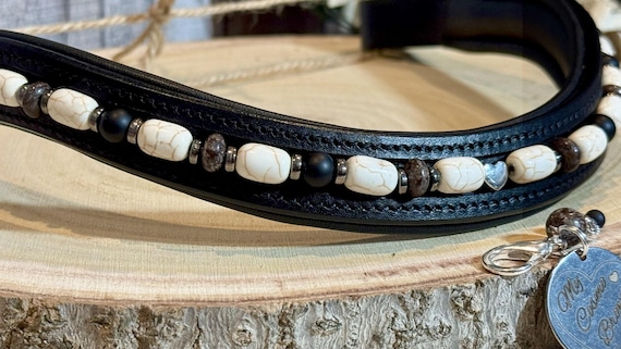 Cosmo Brown - Pattern #826 on a 17" padded, gentle U Black Browband, with nice snaps