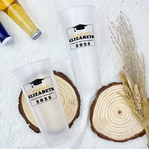 May include: Two frosted glass tumblers with black text and a graduation cap graphic. The text reads "Congrats! Elizabeth Princeton University 2025".
