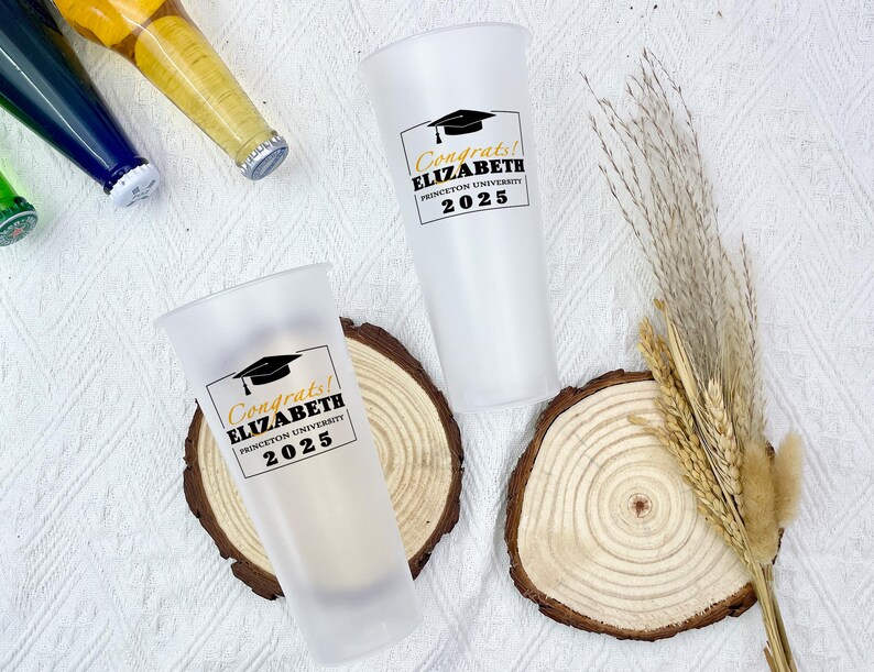 May include: Two frosted glass tumblers with black text and a graduation cap graphic. The text reads "Congrats! Elizabeth Princeton University 2025".