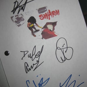 May include: White paper with multiple signatures in black and blue ink. The word "SWARM" is written in red. An illustration of a person cleaning a red stain is also present.