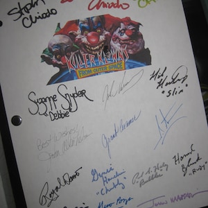 May include: A white sheet of paper with signatures from the cast of the movie Killer Klowns from Outer Space. The signatures include:  Stephen Chiodo, Edward Chiodo, Charlie Chiodo, Suzanne Snyder, John Vernon, Grant Cramer,  and others.