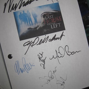May include: A white sheet of paper with multiple signatures in black and blue ink. A small image from "The Last House on the Left" movie is in the center. The image shows a group of people in blue and a close-up of a person's face.