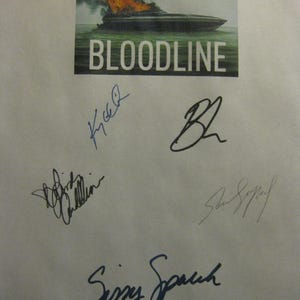 May include: A print featuring a burning boat on water, with the word "BLOODLINE" in white text. Several signatures in blue ink are below the image, likely autographs.