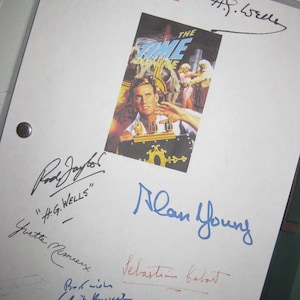 May include: A white sheet of paper with multiple signatures in black, blue, and red ink. The signatures include "H.G. Wells", "Alan Young", "Sebastian Cabot", and "Doris Lloyd". The paper also features a small image of a man in a movie poster for "The Time Machine".