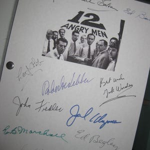 May include: A black and white photo of the cast of the play "12 Angry Men" with their autographs. The signatures include: Henry Fonda, Mark Balsam, Ed Binns, Robert Webber,  John Fiedler,  Jack Warden,  B.S. Marshal, Ed Begley, George Voskovec, and  Joseph Sweeney.