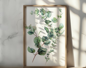 May include: A framed watercolour print of eucalyptus leaves in shades of green on a white background.