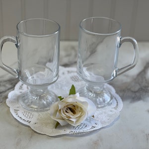 Pair of Vintage Clear Glass Footed Irish Cream Coffee Mugs