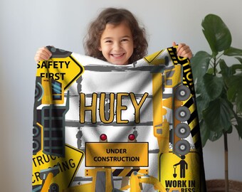 Custom Personalized Kids Name Blanket, Big Construction Trucks on a toddler blanket.  Three Sizes of customizable blankets for children.