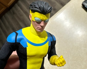 Combinaison invincible 1/12 uniquement