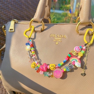 Adorable dije para bolso con cara feliz, dije para bolso con cara sonriente multicolor, dije para bolso con cuentas de arcoíris de doble cadena, dije para bolso personalizado
