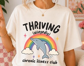 Supuestamente prosperando Camiseta de delfín Enfermedad crónica Síndrome POTS Fibromialgia Esclerosis múltiple EDS vEDS IIH Discapacidad oculta Endometriosis