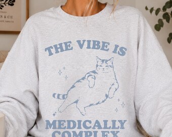 El ambiente es médicamente complejo Suéter Gato Divertido Sarcástico Suéter Síndrome de POTS Fibromialgia Esclerosis múltiple EDS IIH Epilepsia Endometriosis