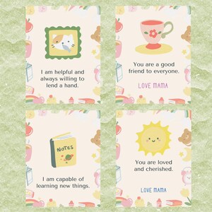 May include: Four colorful affirmation cards with illustrations and text. The cards feature a cat, a teacup, a book, and a sun. The text on the cards reads: "I am helpful and always willing to lend a hand." "You are a good friend to everyone. LOVE MAMA." "I am capable of learning new things." "You are loved and cherished. LOVE MAMA."