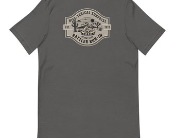 May include: A dark gray t-shirt with a vintage-style logo featuring a rattlesnake, cacti, and the text "Hiss-terical Surprise Desert Life Rattler Run-In Est. 2023".