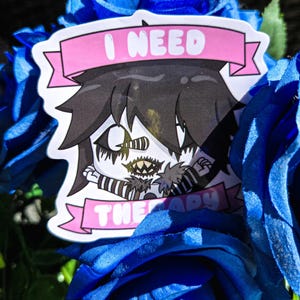 Adesivo chibi Laughing Jack ‘Preciso de terapia’
