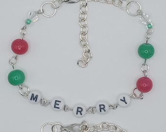 May include: Two silver chain bracelets with red and green beads and a white charm that says "MERRY".