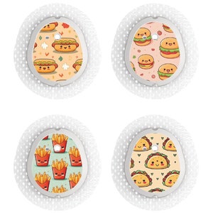 May include: Four round, white adhesive patches with different food-themed patterns. The patterns include hot dogs, hamburgers, french fries, and tacos. Each patch has a small hole in the centre.