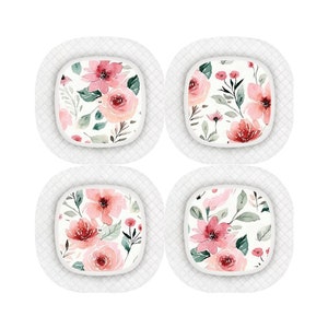 May include: Four white square adhesive bandages with a floral design. The design features pink and red watercolour flowers with green leaves on a white background.
