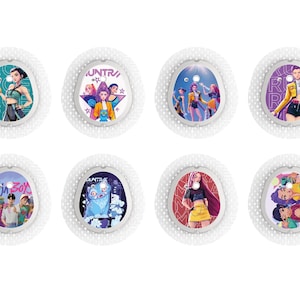 May include: A collection of eight white, circular decorative items, each featuring a different colorful graphic design. The designs include illustrations of people, text, and cartoon characters. The items have a textured, dotted border.