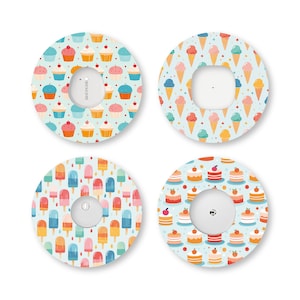 May include: Four circular adhesive patches for medical sensors, each featuring a distinct pattern: cupcakes, ice cream cones, popsicles, and layered cakes. The designs use pastel colors including light blue, pink, orange, and yellow on white backgrounds.