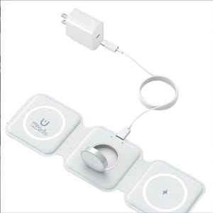 May include: A white, foldable wireless charging station with a connected white power adapter. The station has three charging pads, one for a smartwatch and two for other devices. The brand name "PAUL VALENCE" is printed on one of the pads.