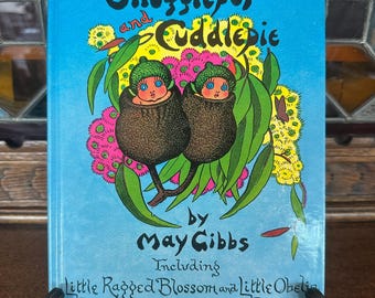 Las aventuras completas de Snugglepot y Cuddlepie de May Gibbs (década de 1908), libro de tapa dura