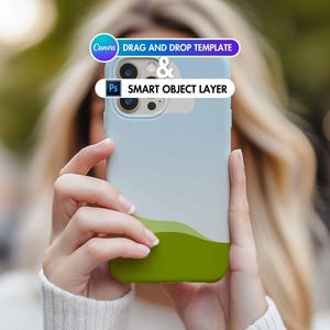 May include: A light blue phone case with a green landscape design. The case has a "DRAG AND DROP TEMPLATE & SMART OBJECT LAYER" label on it.